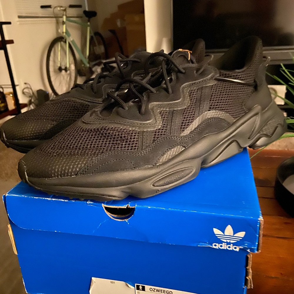 All black Ozweegos size 13